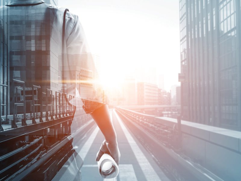 Future building construction engineering project concept with double exposure graphic design. Building engineer, architect people or construction worker working with modern civil equipment technology.
